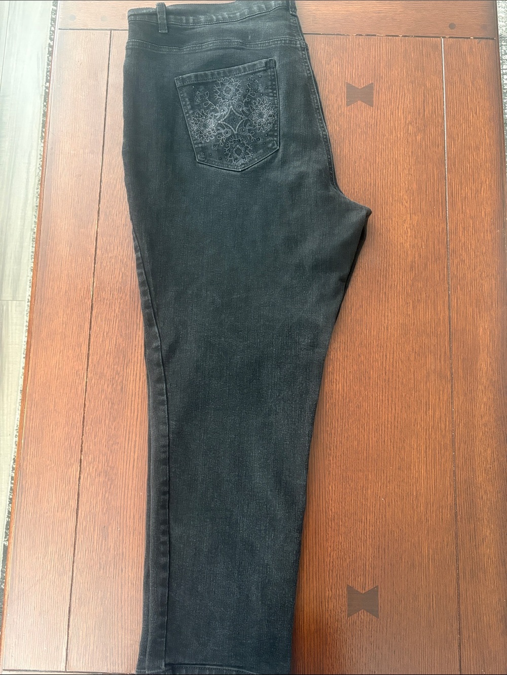 Black jeans , Amanda with floral decor on pockets